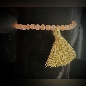 Elegant Beaded Bracelet with Tassel